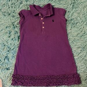 Girls purple polo shirt with ruffle bottom